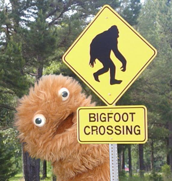 Coleman the Sasquatch with Bigfoot crossing sign.